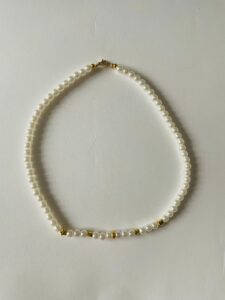 Colier Handmade „Perlă Stelară" – Strălucire de Stea Purtată la Gât Colier Handmade „Perlă Stelară" – Strălucire de Stea Purtată la Gât