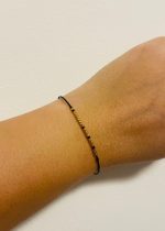 Brățară reglabilă pe șnur negru cu mesaj în cod Morse: Echilibru